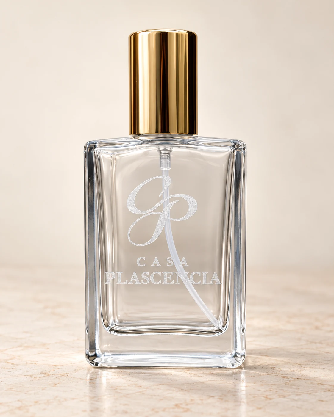 CASA PLASCENCIA flat engraved spray bottle with a gold cap, studio retouch